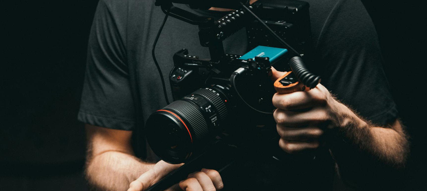 Camera operator holding a cinema camera